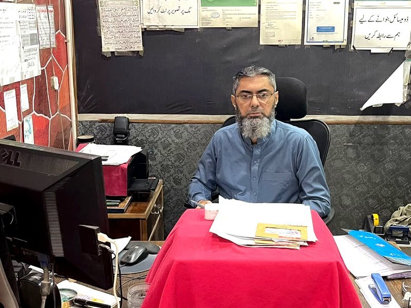 The counter at Umer Composing Center, Harbanspura, Lahore